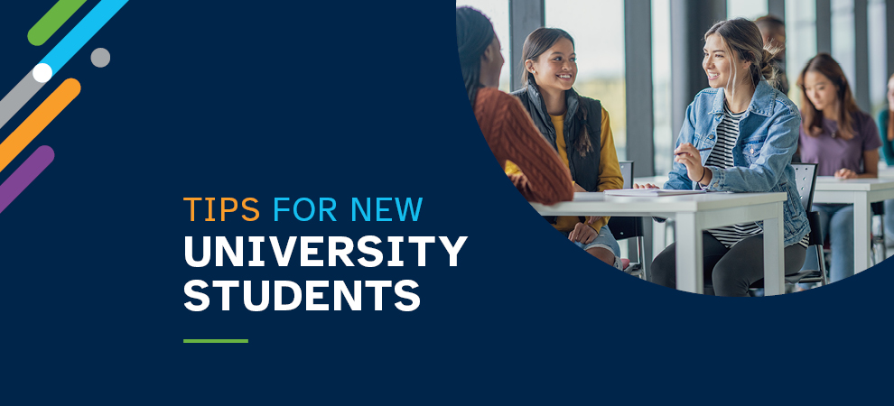 Dark blue banner with university students sitting around a white table having a discussion.  